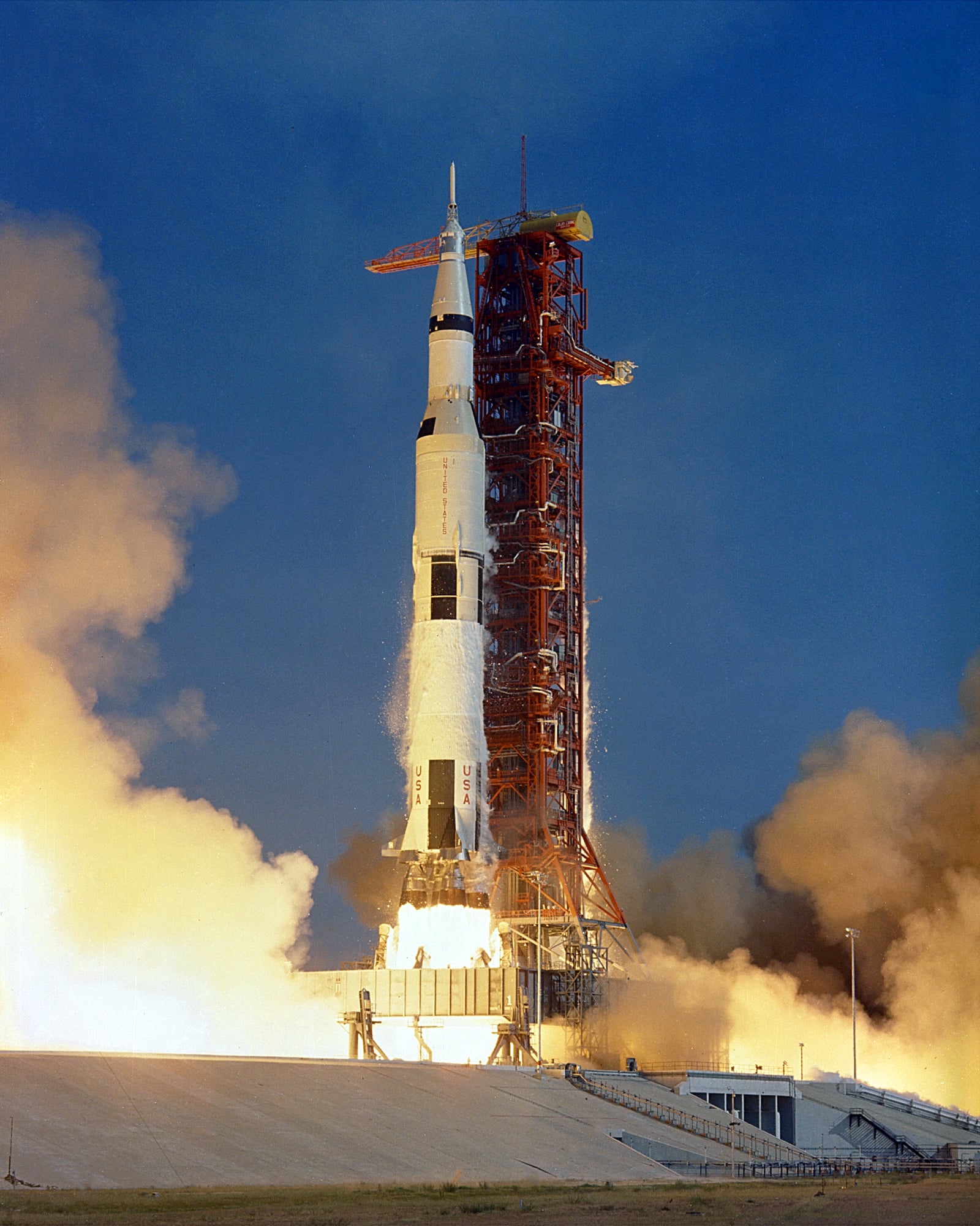 The Apollo 11 Saturn V rocket launch vehicle lifts-off with astronauts Neil A. Armstrong, Michael Collins and Edwin E. Aldrin, Jr., at 9:32 a.m. EDT July 16, 1969, from Kennedy Space Center's Launch C