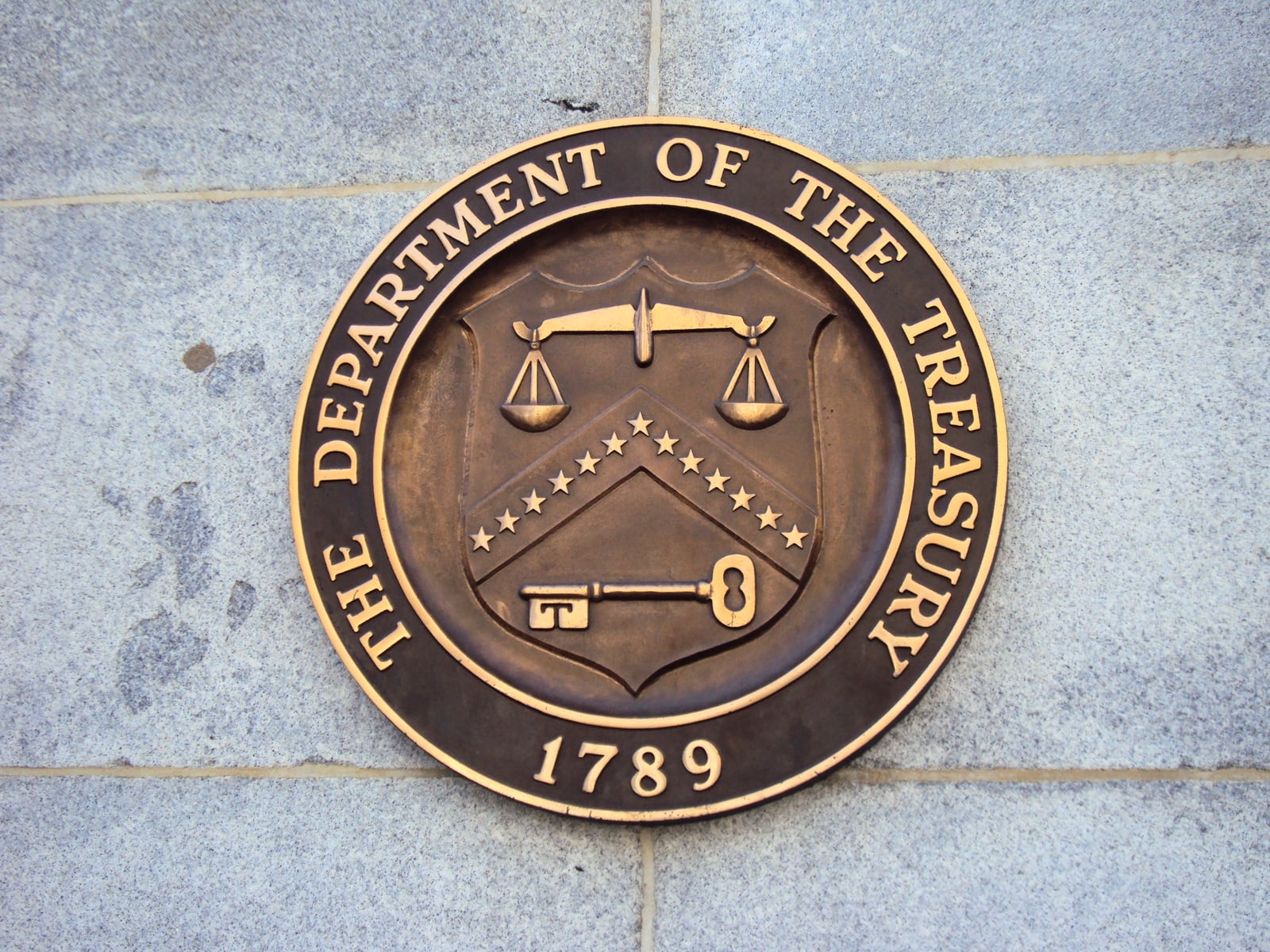 Seal of United States Department of the Treasury on the Building, Washington DC.