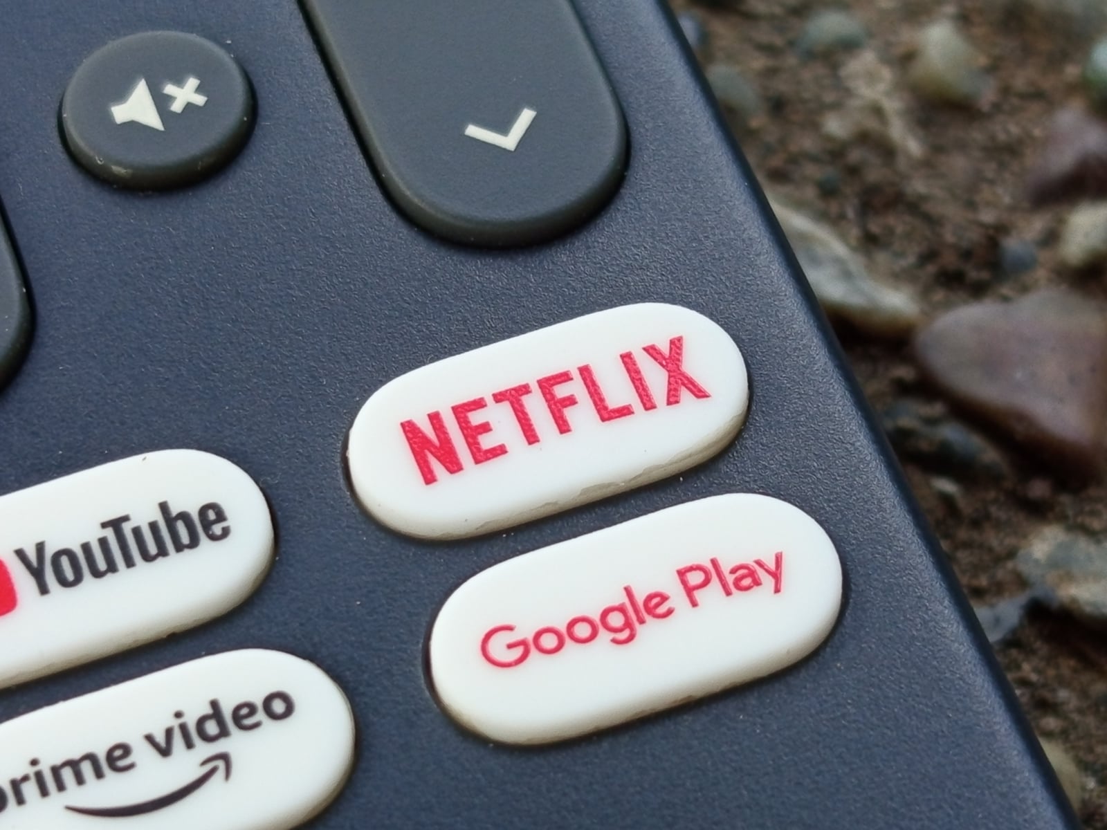 The Netflix button on a Google Android TV Reference RCU (G10) remote. The other buttons present besides the Netflix button are the Prime Video, Google Play, and Youtube buttons.