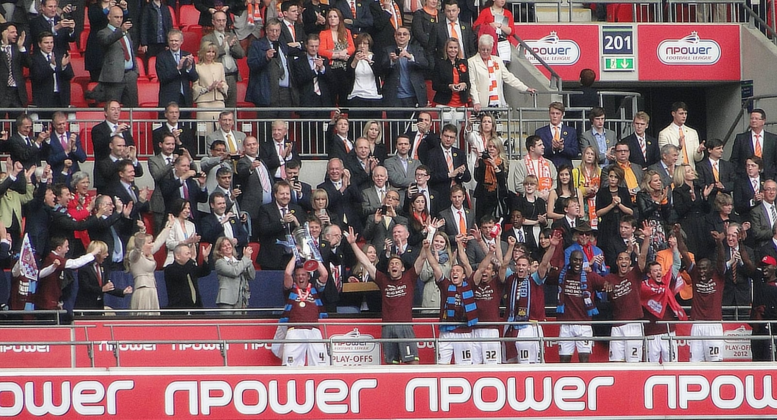 Captain Kevin Nolan lifts the trophy after West Ham win the 2012 Football League Championship play-off Final at Wembley.